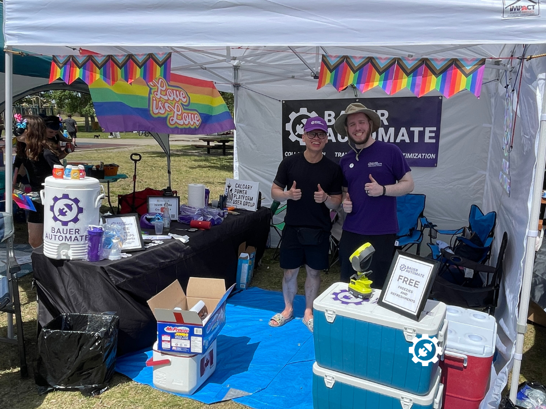 David He and Ryley Bauer of Bauer Automate at Airdrie PrideFest