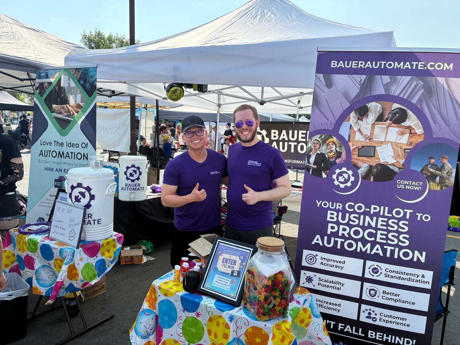 David He and Ryley Bauer of Bauer Automate at Airdrie Fest